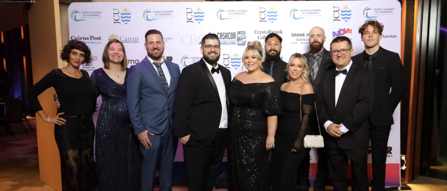A group of people standing next to each other