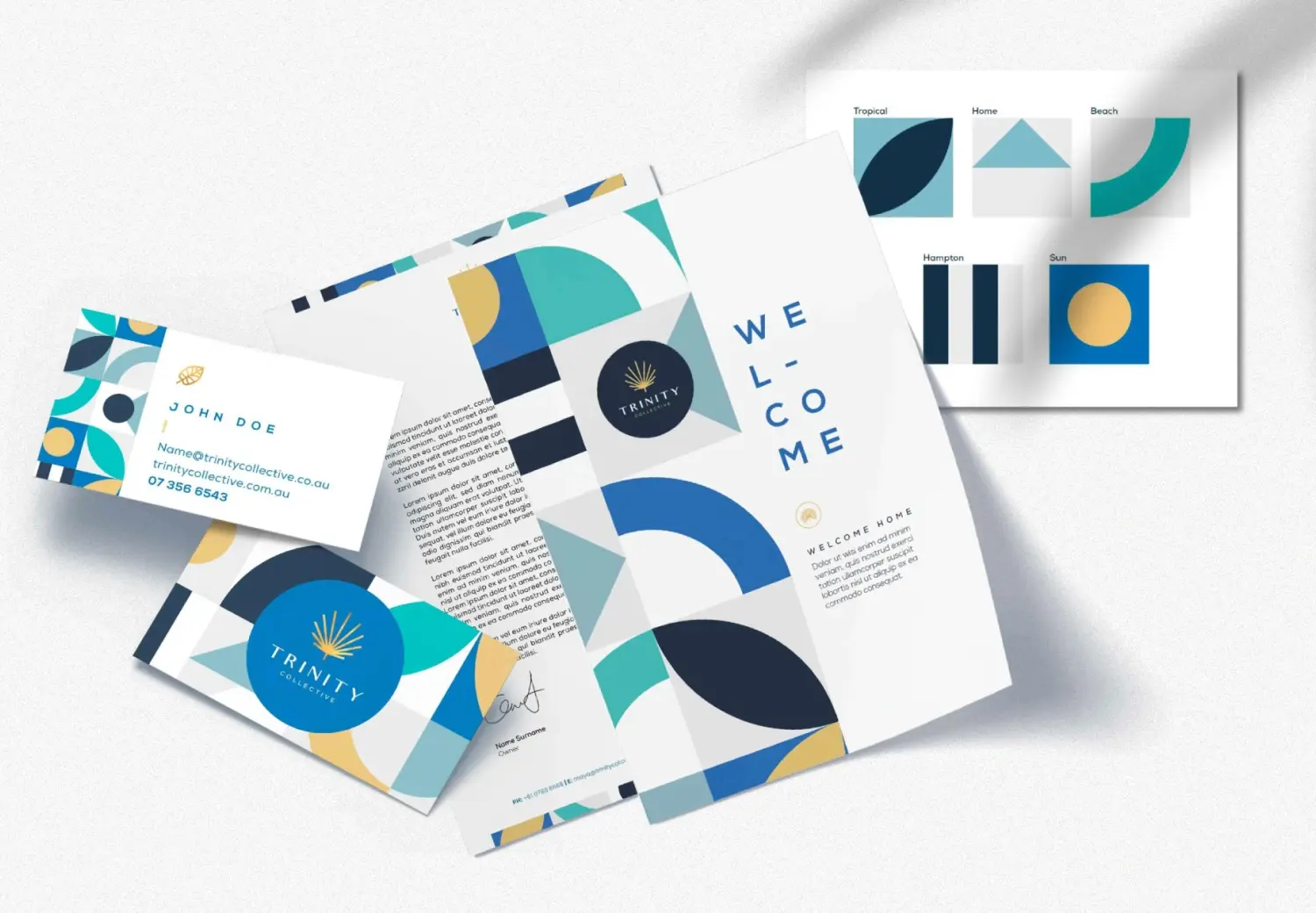 A brochure with a geometric design and a business card